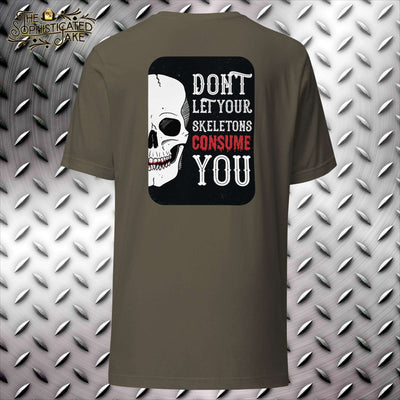 Army colored t-shirt with a black rectangle.  In the rectangle is a picture of half of a skull with the text, 