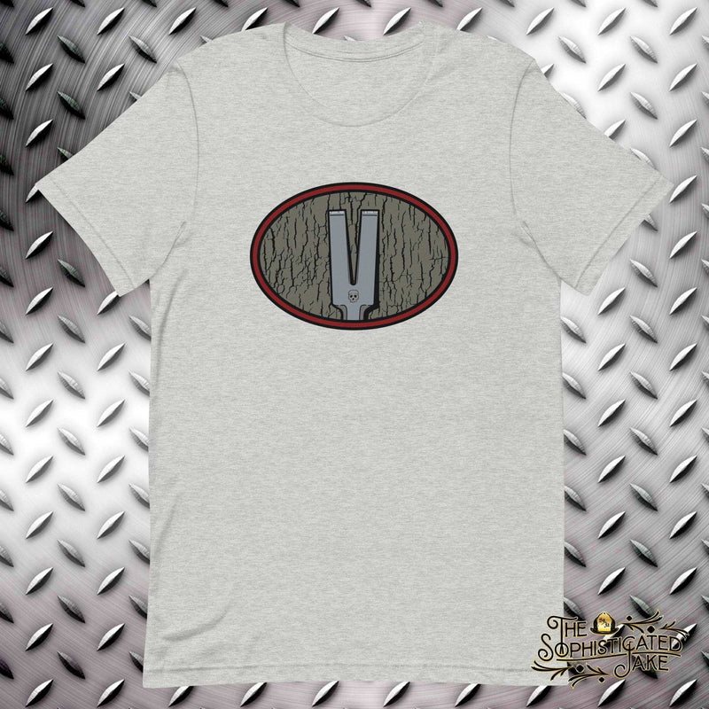 Gray t-shirt with oval desing on the chest.  In the field of the oval is a distressed tan color and the fork end of a halligan bar with a decorative skull.  Halligan T-Shirt