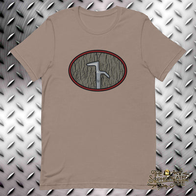 Tan t-shirt with a firefighter's hook in the center of an oval design in the center of the chest of the shirt.  The field of the oval is a distressed tan and the hook has a decorative skull on the bottom of the bar.